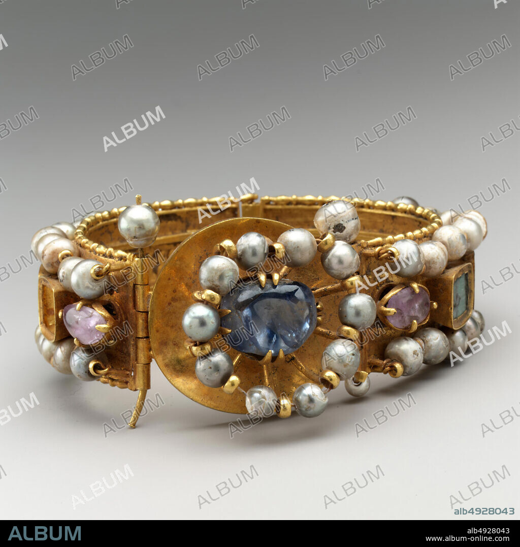 Jeweled Bracelet, Byzantine, 500700, Made in probably Constantinople, Byzantine, Gold, silver, pearl, amethyst, sapphire, opal, glass, quartz, emerald plasma, Overall: 1 7/16 x 3 1/4 in. (3.7 x 8.2 cm), strap: 15/16 x 7 7/8 in. (2.4 x 20 cm), bezel: 1 5/16 in. (3.4 cm), Metalwork-Gold.