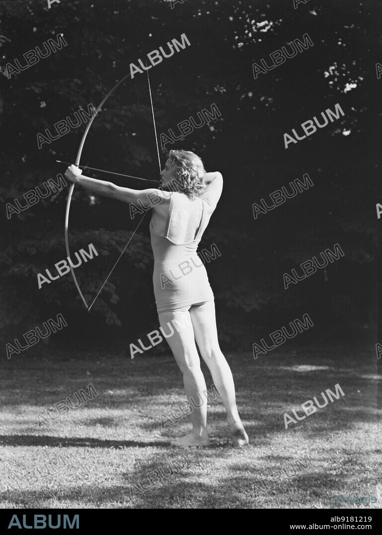 ARNOLD GENTHE. Chase, Diana, Miss, doing archery, 1933 June 22.