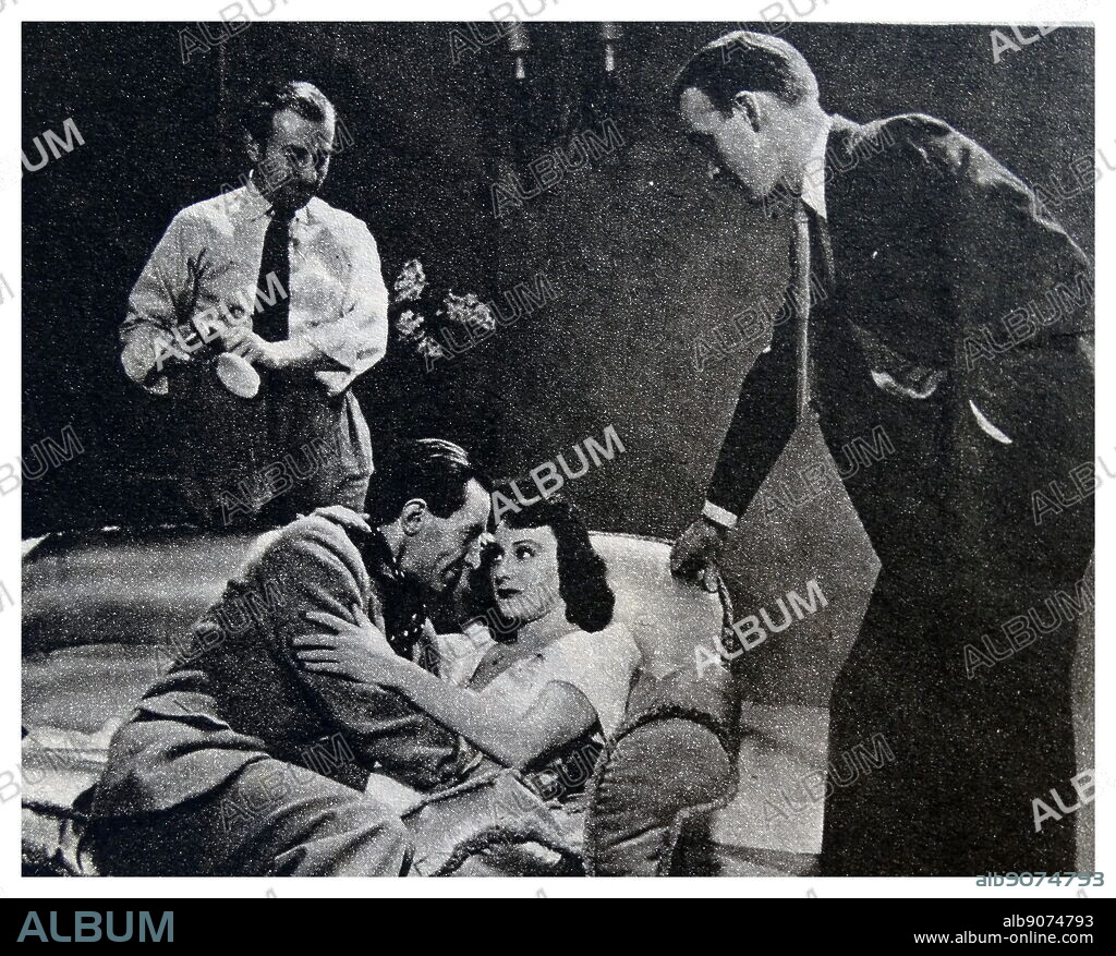 Director David MacDonald with Barry Barnes and Judy Kelly in The Midas Touch, a 1940 British thriller film. David MacDonald (9 May 1904 in Helensburgh, Dunbartonshire - 22 June 1983 in London) was a Scottish film director, writer and producer. Barry K. Barnes (27 December 1906 - 12 January 1965) was an English film and stage actor. Julie Aileen Kelly (1 November 1913 - 22 October 1991), known professionally as Judy Kelly, was an Australian-born British actress.