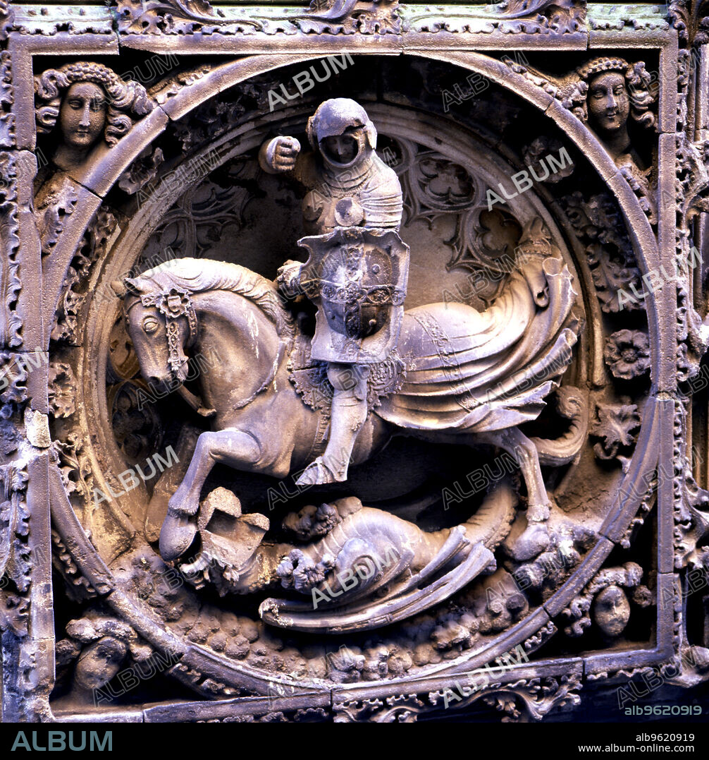 Sant Jordi medallion at the entrance of the Gothic façade of the Palace of the Generalitat of Catalonia.