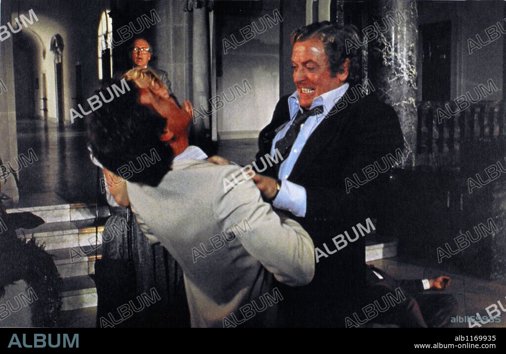 ANTHONY ANDREWS and MICHAEL CAINE in THE HOLCROFT COVENANT, 1985, directed by JOHN FRANKENHEIMER. Copyright EMI.
