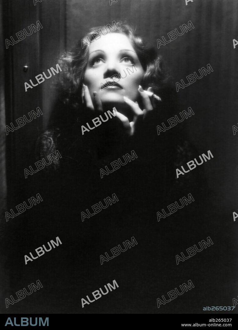MARLENE DIETRICH in SHANGHAI EXPRESS, 1932, directed by JOSEF VON STERNBERG. Copyright PARAMOUNT PICTURES / ENGLISH, DON. Custom by Travis Banton.