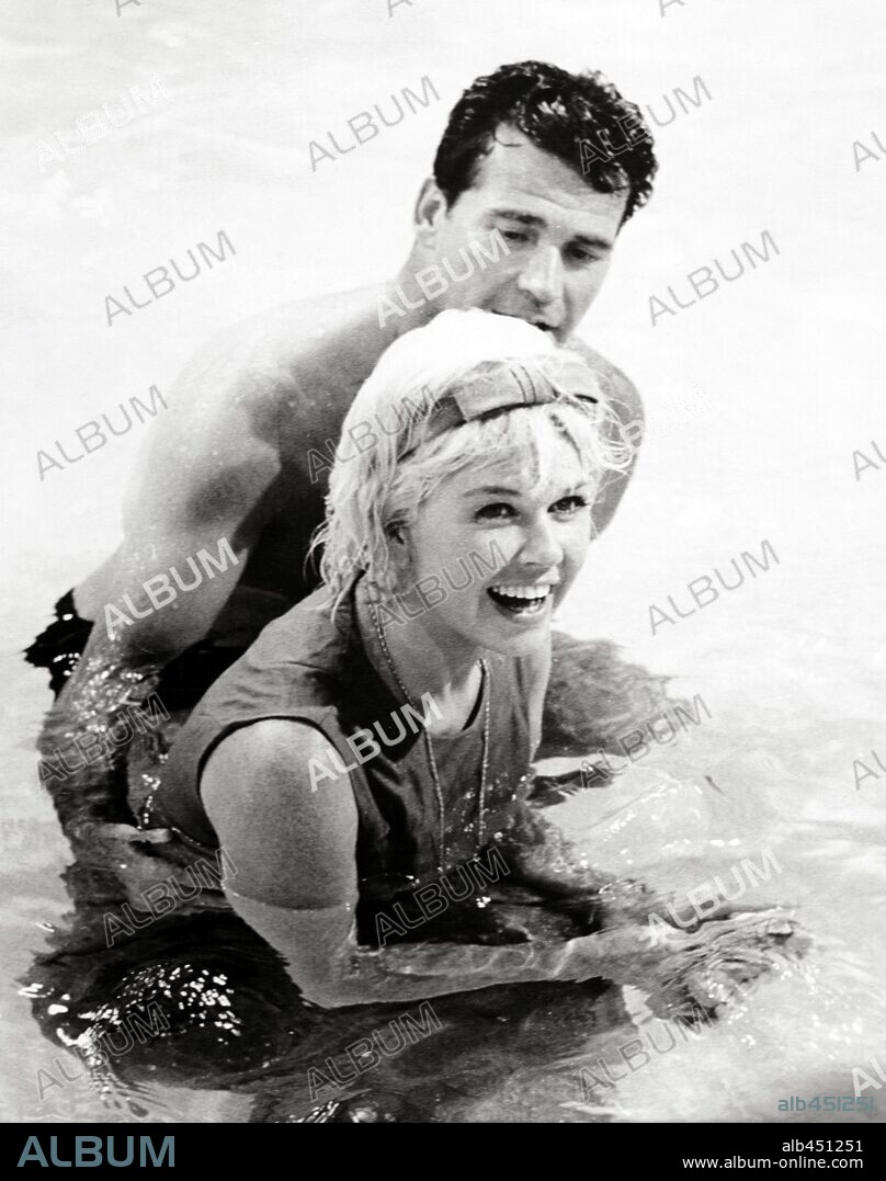 DORIS DAY und JAMES GARNER in MOVE OVER, DARLING, 1963, unter der Regie von MICHAEL GORDON. Copyright 20TH CENTURY FOX.