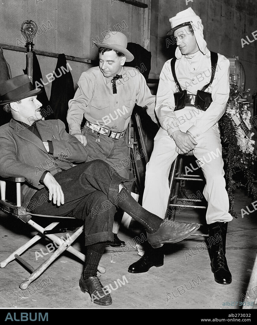 GARY COOPER and WILLIAM A. WELLMAN in BEAU GESTE, 1939, directed by WILLIAM A. WELLMAN. Copyright PARAMOUNT PICTURES.