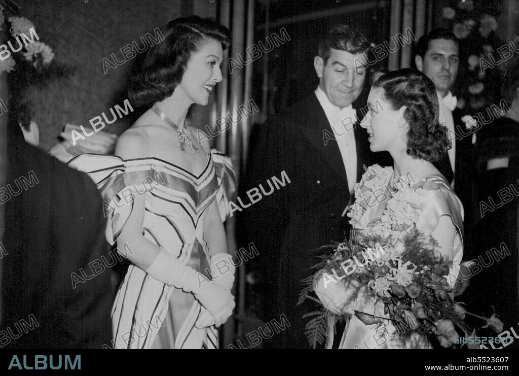 Royal Command Film Performance -- Princess Margaret chat to Loretta Young (Star Lead of the film after the performance tonight at the Odeon, Leicester Square, London.There was huge crowds outside the Odeon, Leicester-square, to-night to see Their Majesties The King and Queen H.R.H. Princess Margaret, and a host of American and British screen stars arrive for the Royal Command Film Performance. Besides "The Bishops Wife" - the film selected for this year's show - the royal visitors saw the colour film of the royal wedding and a stage show featuring Phyllis Calvert, Carolo Landis, Margaret Lockwood, Vivien Leigh, Anna Neagle, Lilli Pulmer, Patricia Roc, Alexis Smith, Loretta Young, Ann Todd, Stewart Granger, Rex Harrison, Bob Hope, Rober Montgomery November 25, 1947.