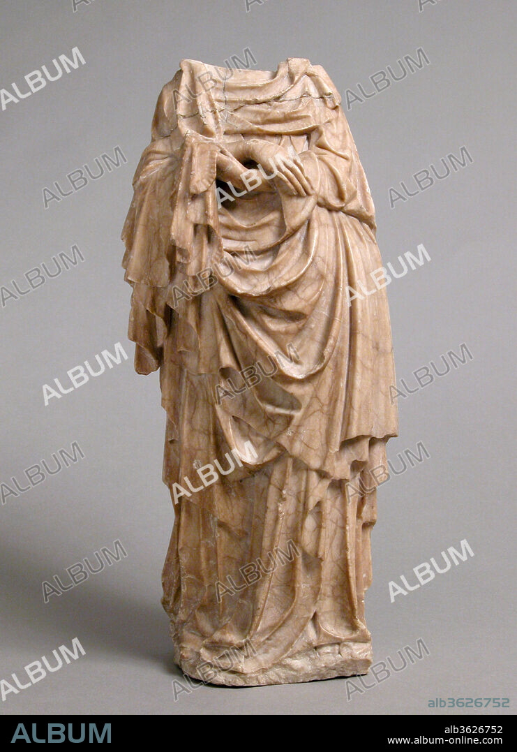 Holy Woman. Artist: Master of Rimini. Culture: North French or South Netherlandish. Dimensions: Overall: 14 1/2 x 6 1/4 x 4 in. (36.9 x 15.9 x 10.2 cm). Date: ca. 1430.
Elegant and rhythmic, the expressive drapery of this sculpture of a holy woman closely suggests the style of the Rimini Master.