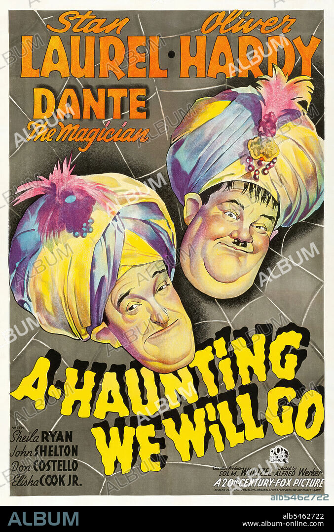 OLIVER HARDY and STAN LAUREL in A-HAUNTING WE WILL GO, 1942, directed by ALFRED L. WERKER. Copyright Laurel and Hardy Feature Productions.