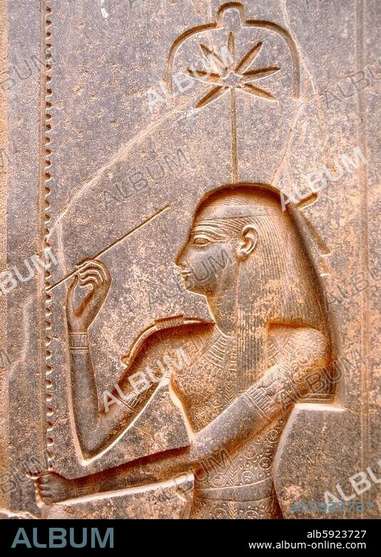 The goddess Seshat, personification of Writing, shown in the act of inscribing the palm leaf rib which denotes the word renpet, year in the hieroglyphic script. Country of Origin: Egypt. Culture: Ancient Egyptian. Date / Period: New Kingdom.