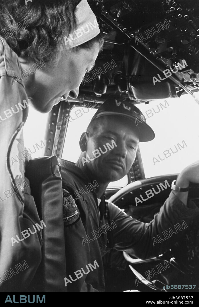 August 10, 1966 - Hurricane Hunters in the cockpit of a WC-121 aircraft during Project Stormfury.
