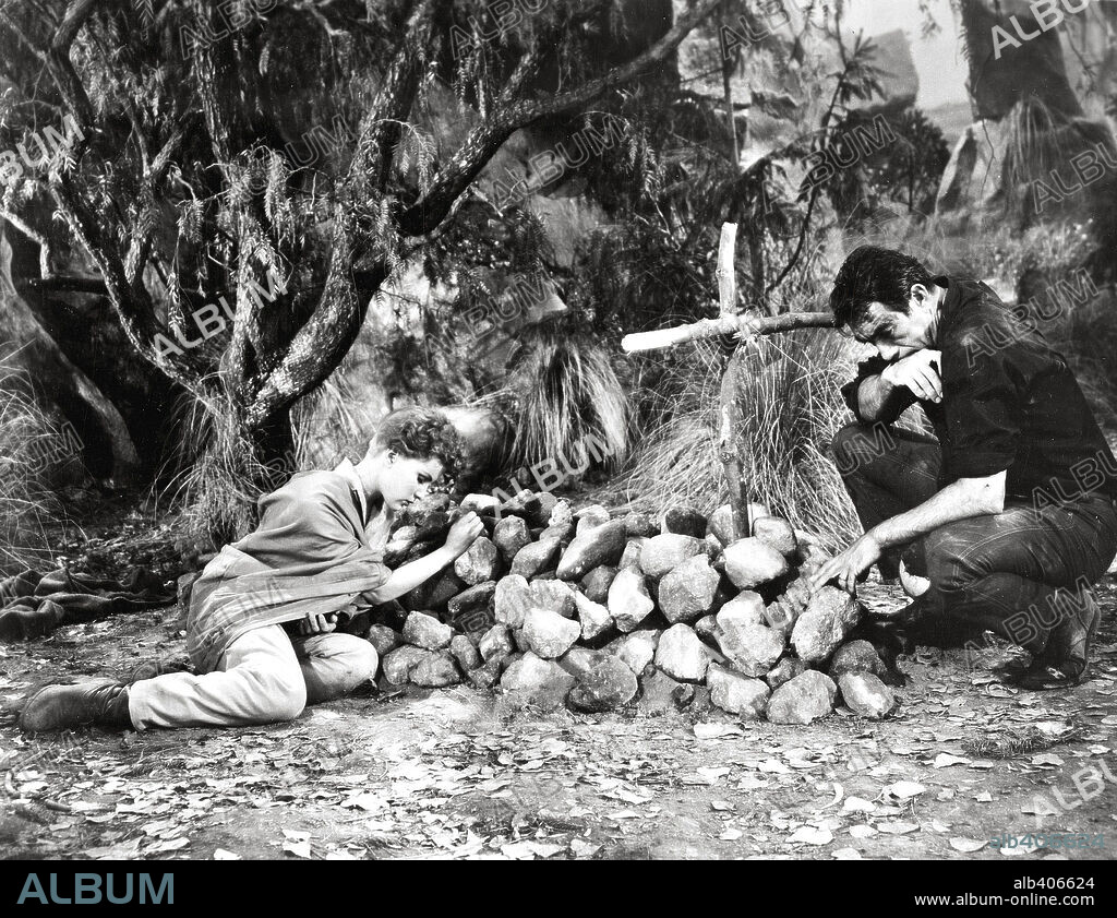 ANTHONY QUINN and DEBRA PAGET in THE RIVER'S EDGE, 1957, directed by ALLAN DWAN. Copyright 20TH CENTURY FOX.