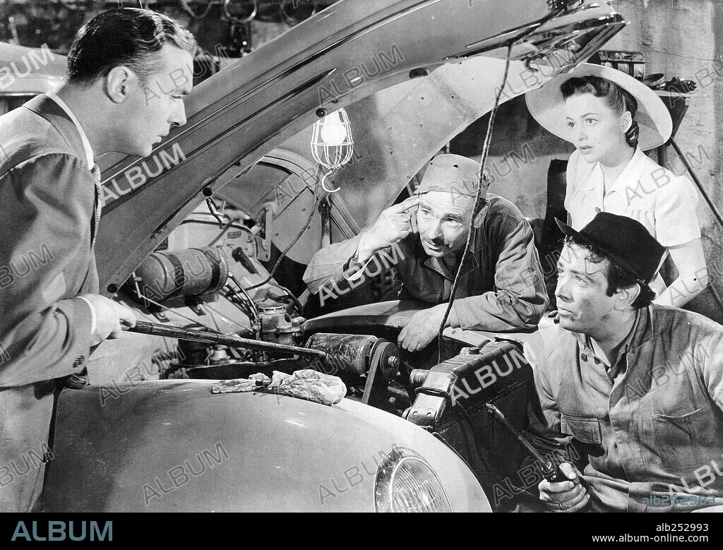 CHARLES BOYER, MIKHAIL RASUMNY and OLIVIA DE HAVILLAND in HOLD BACK THE DAWN, 1941, directed by MITCHELL LEISEN. Copyright PARAMOUNT PICTURES.