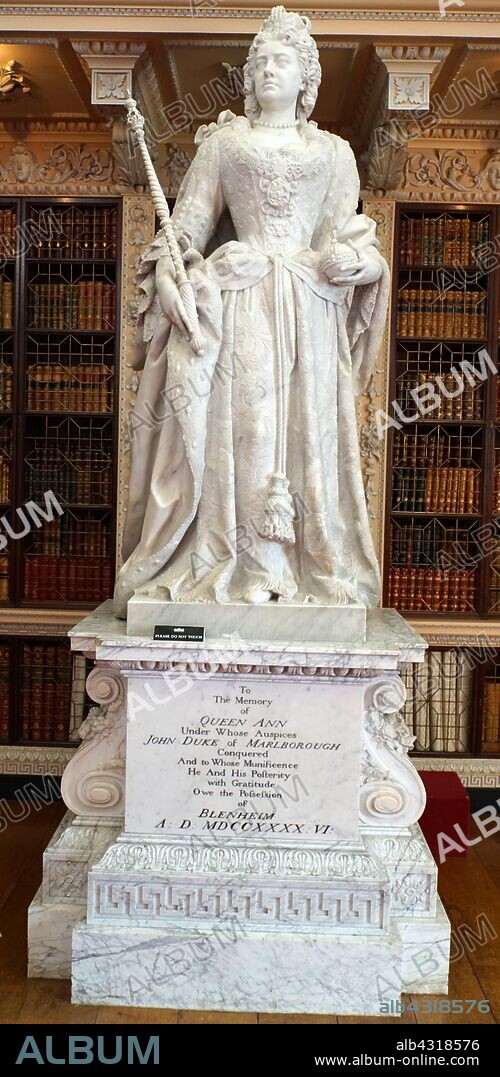 Marble statue of Queen Anne by Johannes Michel Rysbrack in the library at Blenheim Palace, Oxfordshire, England, is the principal residence of the Dukes of Marlborough. John Michael Rysbrack, (1694 - 1770), was an 18th-century Flemish sculptor.