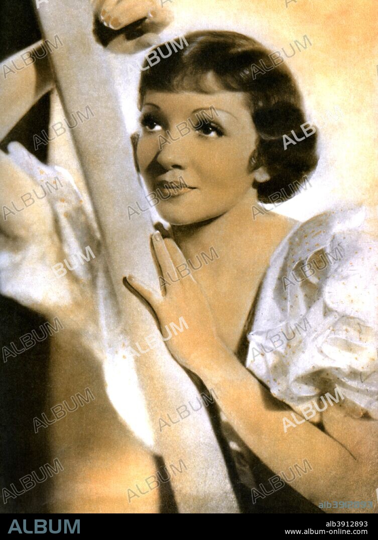 Claudette Colbert, French born American actress, 1934-1935. A star equally adept at romantic comedy and dramatic roles, Colbert  won a Best Actress Academy Award for her performance in It Happened One Night (1934). Taken from Meet the Film Stars, by Seton Margrave. (London, 1934-1935).