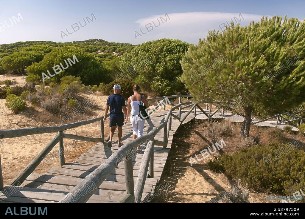 «Parque Dunar» and tourists, Matalascanas beach, Almonte, Huelva province, Region of Andalusia; Spain; Europe.