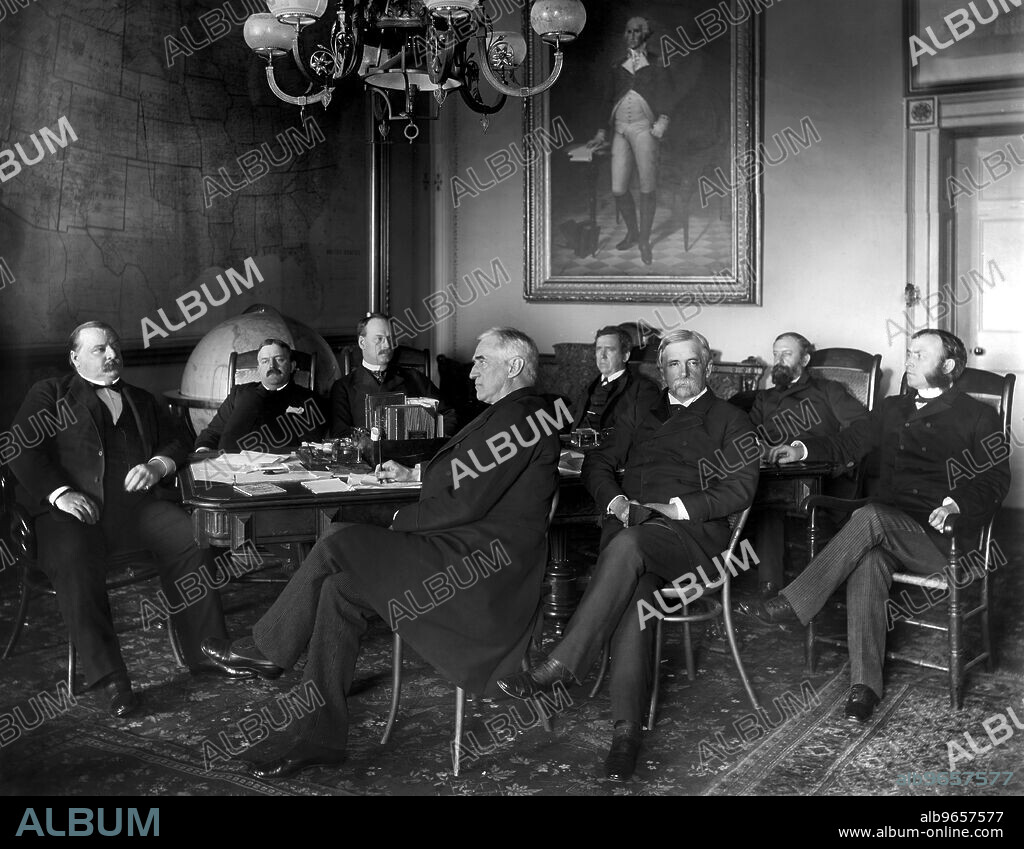 U.S. President Grover Cleveland with members of his Cabinet, L-R: President Grover Cleveland; Charles S. Fairchild, Secretary of the Treasury; William C. Whitney, Secretary of the Navy; Augustus H. Garland, Attorney General; Thomas F. Bayard, Secretary of State; William C. Endicott, Secretary of War; William F. Vilas, Secretary of the Interior; and Donald M Dickinson, Postmaster General, Photograph by Charles Milton Bell, Washington DC, USA, 1889.