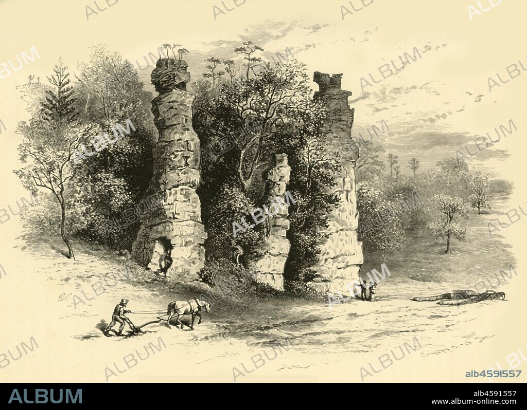 FREDERICK WILLIAM QUARTLEY. 'Natural Towers', 1872. Rock formation in Augusta County, Virginia, USA: '...the Towers rise straight up from the cultivated field. The illusion is perfect; anyone would mistake them for a ruined work of human hands. No other rocks are visible. From a distance, the ragged peaks of the Towers are transformed almost without an effort of the imagination into crumbling embrasures and machicolations...the resemblance to a feudal ruin, the curtain-wall, with flanking towers, and low, central archway, is exact. It would hardly be a surprise if, issuing from the gateway, a knightly cortege, in glistening helms and hauberks, with pennons flaunting gayly, should file off to the neighboring highway, and proceed to levy toll upon a belated and unprotected wagon-train'. From "Picturesque America; or, The Land We Live In, A Delineation by Pen and Pencil of the Mountains, Rivers, Lakes...with Illustrations on Steel and Wood by Eminent American Artists" Vol. I, edited by William Cullen Bryant. [D. Appleton and Company, New York, 1872].