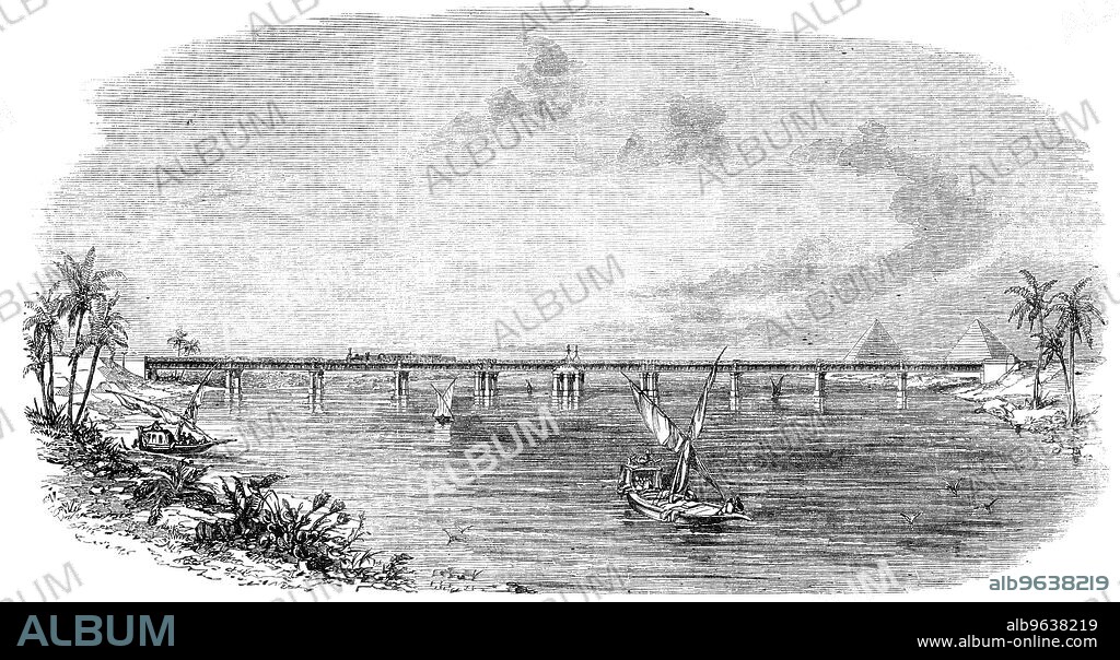Wrought-Iron Railway-Bridge across the Nile, at Benha, 1856. 'The engineer of this fine work is Mr. Robert Stephenson...The Bridge is the property of the Pacha of Egypt, and has been constructed for the use of the Egyptian Railway Company. It is now open for traffic; the trains now conveying the Overland passengers to India from Alexandria to Cairo, instead of donkeys, camels, and the Nile boat as before. The bridge, with all its piers or caissons, is made entirely of iron, and is composed of a wrought-iron tube, in three distinct lengths, that at the centre opening for the passage of vessels....The machinery for opening is concealed within the ornamental capping of the centre piece, and is so arranged that two men can easily open or close the bridge at pleasure. The top and bottom trams at the centre (upon which the rollers and tube revolve) weigh nearly eighty tons...'. From "Illustrated London News", 1856.