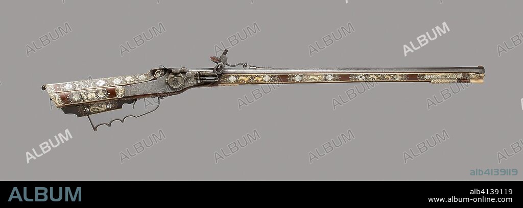Wheellock Rifle. East German of Polish (Silesia, possibly Teschen). Date: 1625-1650. Dimensions: L. 106.7 cm (42 in.)
Barrel L. 80 cm (31 1/2 in.)
Caliber .55
Wt. 6 lb. 8 oz. Steel, fruitwood, staghorn, mother-of-pearl. Origin: Germany.