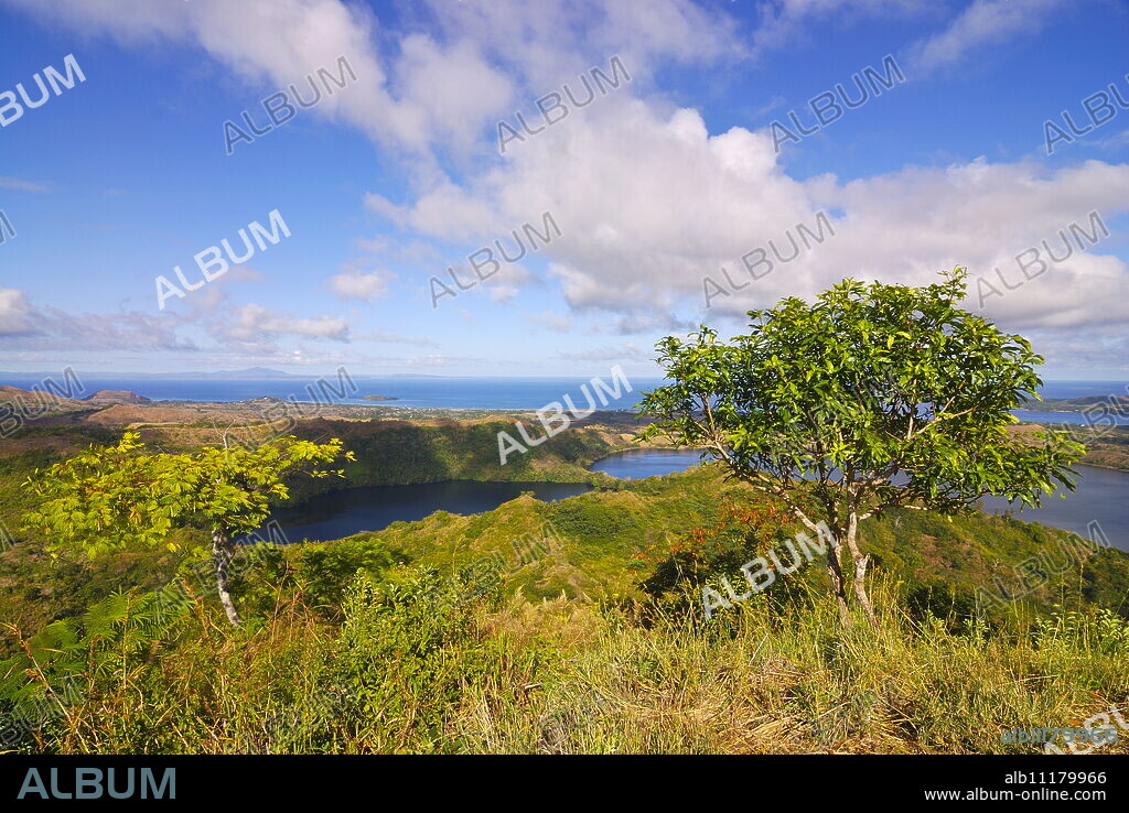 Volcanic lake and the coast of Nosy Be from Mont Passot, Madagascar, Indian Ocean, Africa.