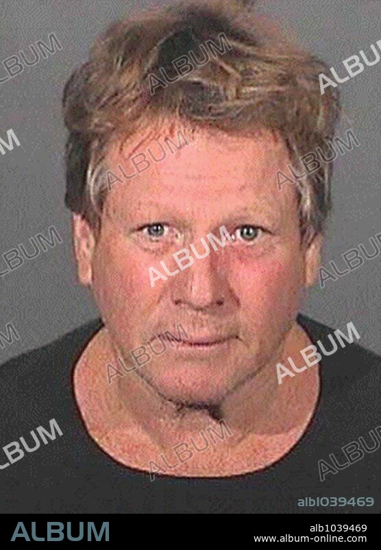 Sep 17, 2008 - Malibu, California, USA - Actor RYAN O'NEAL, and his son Redmond, were arrested on suspicion of narcotics possession after a search of the actor's home in Malibu, California. Redmond O'Neal, 24, allegedly was found in possession of methamphetamine. A vial of the drug was also found in Ryan O'Neal's bedroom, according to a spokesman for the Los Angeles County Sheriff. The father and son were released on $10,000 bail each. Redmond, whose mother is actress Farrah Fawcett, was arrested in 2007 on charges related to carrying heroin and crystal meth while driving under the influence in Malibu. Ryan O'Neal, 67, was arrested last year after firing a gunshot during an argument with another son, Griffin O'Neal. 17/09/2008