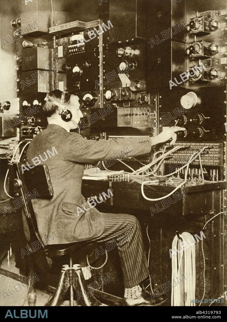 First transatlantic telephone call, from London to New York, 7 March 1926, (1935). 'Ringing Up "Uncle Sam"...the actual scene at the switchboard when London spoke to America by radio telephone'. From "The Silver Jubilee Book - The Story of 25 Eventful Years in Pictures". [Odhams Press Ltd., London, 1935].