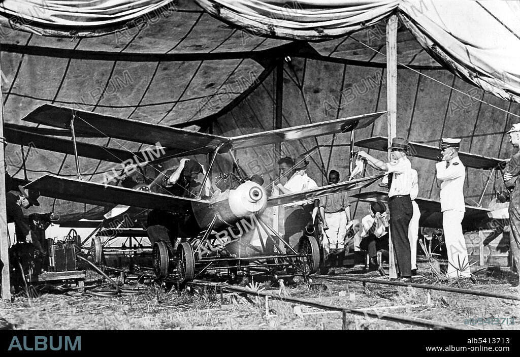 In 1917 Charles F. Kettering invented the unmanned Kettering Aerial Torpedo, nicknamed the Bug. Launched from a 4-wheeled dolly that ran down a portable track, the Bug's system of internal pre-set pneumatic and electrical controls stabilized and guided it toward a target. After a predetermined length of time, a control closed an electrical circuit, which shut off the engine. The wings were released and its 180 pounds of explosive detonated on impact. The Bug never saw combat. After the war, the US Army Air Service conducted additional tests, but the scarcity of funds halted further development.