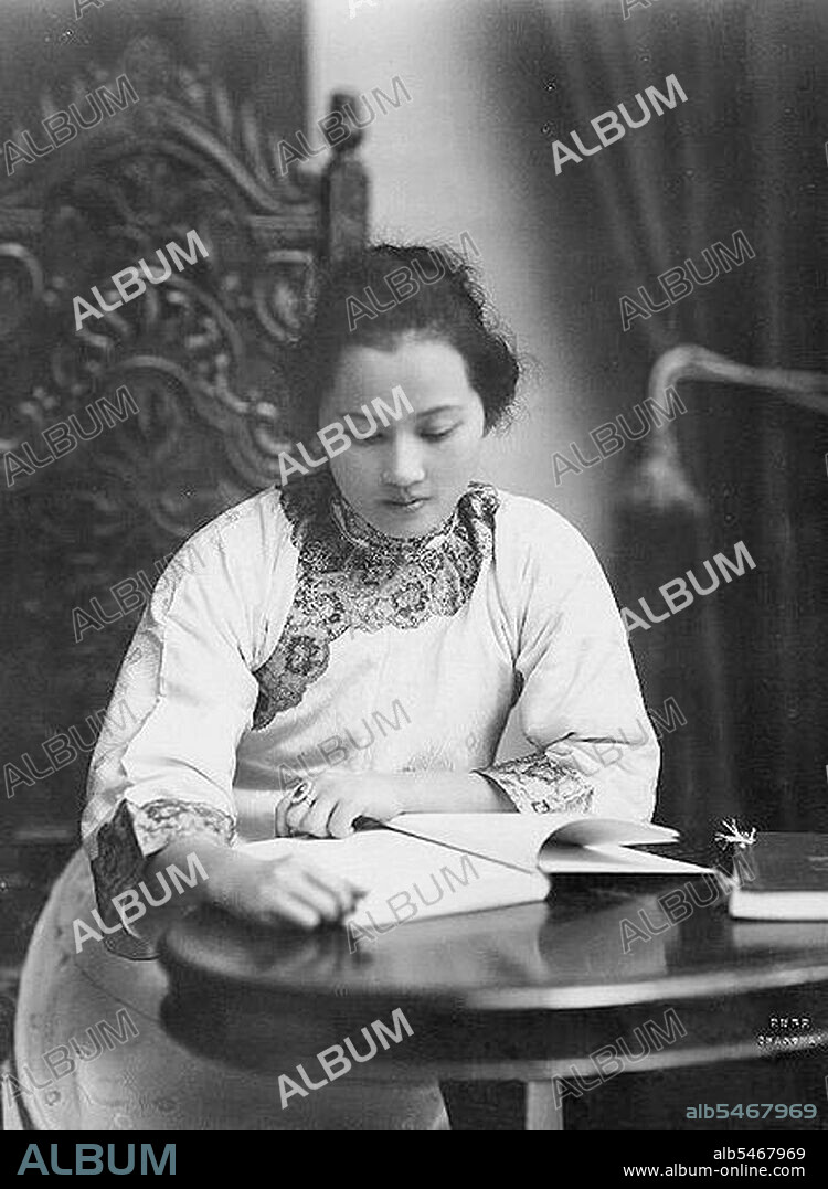 Soong Ch'ing-ling, Shanghai, 1920 (pinyin: Song Qingling, 27 January 1893 - 29 May 1981), also known as Madame Sun Yat-sen, was one of the three Soong sisters who, along with their husbands, were amongst China's most significant political figures of the early 20th century. She was the Vice Chairman of the People's Republic of China. She was the first non-royal woman to officially become head of state of China, acting as Co-Chairman of the Republic from 1968 until 1972. She again became head of state in 1981, briefly before her death, as President of China. Soong is sometimes regarded as Asia's first female non-monarchial head of state, although her title of Honorary President of the People's Republic of China was purely ceremonial. As Dr Sun Yat-sen's secretary and assistant, Madam Soong Ching Ling took painstaking care of his correspondence, newspaper clippings, translation and typing. This photograph taken in Shanghai in 1920 shows Madam Soong at work in the study room.