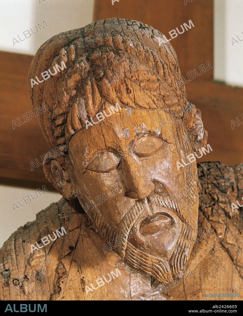 Romanesque art. Spain. The Descent from the Cross. Detail. Face. 12th century. Poplar and walnut wood with traces of polychromy. From the church of Santa Eulalia in Erill la Vall. Catalonia, Episcopal Museum. Vic.