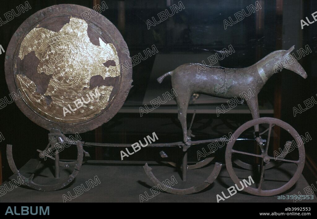 Sun-chariot from Trundholm Bog in north west Zealand, Denmark. It is made of bronze and gold leaf, and is the best evidence for sun worship in the early bronze age. Now from the National Museum's collection in Copenhagen.