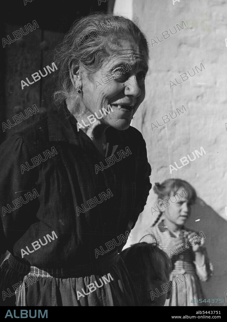 Face of an old granny, living near the town, was lined and worn. June 1, 1949. (Photo by Steven Henty, Pictorial Press).