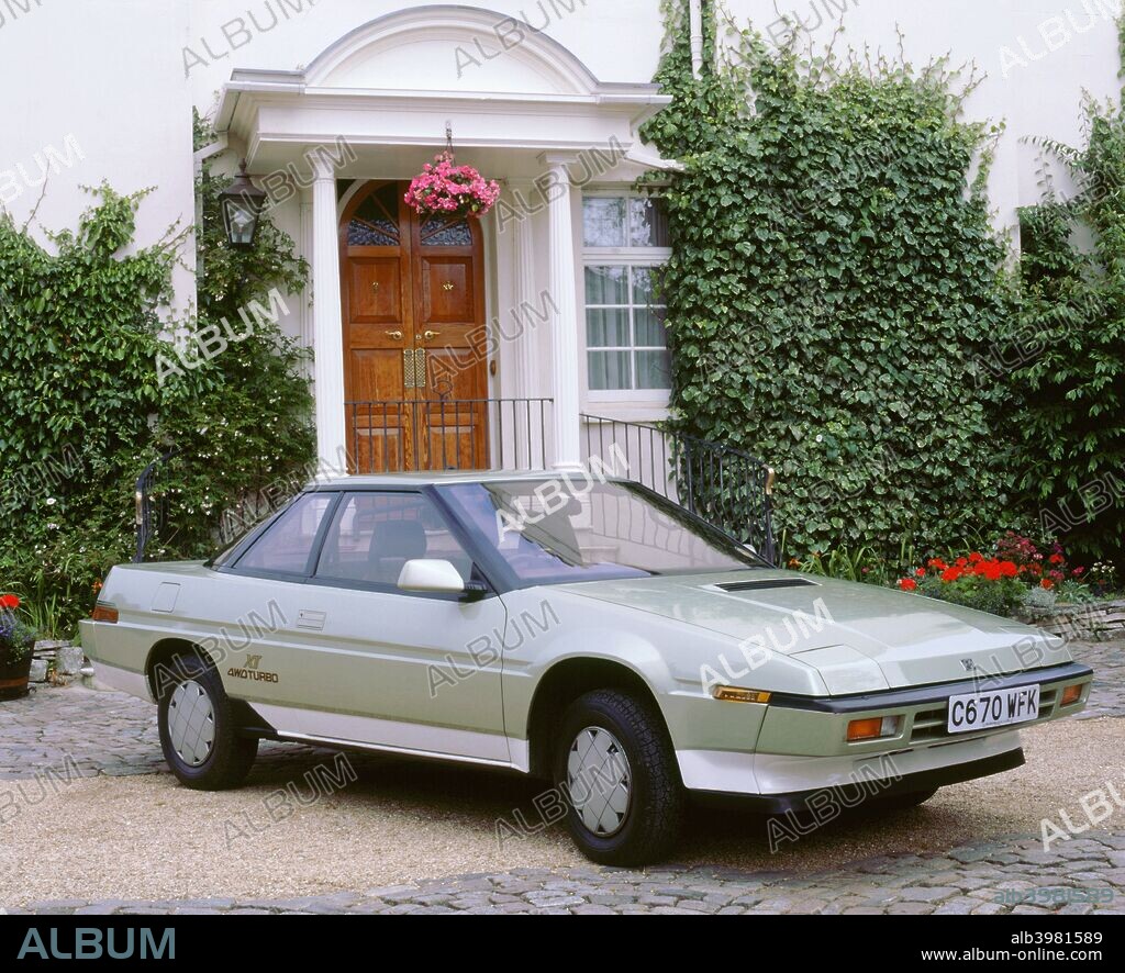 1986 Subaru XT 4WD Turbo outside house.