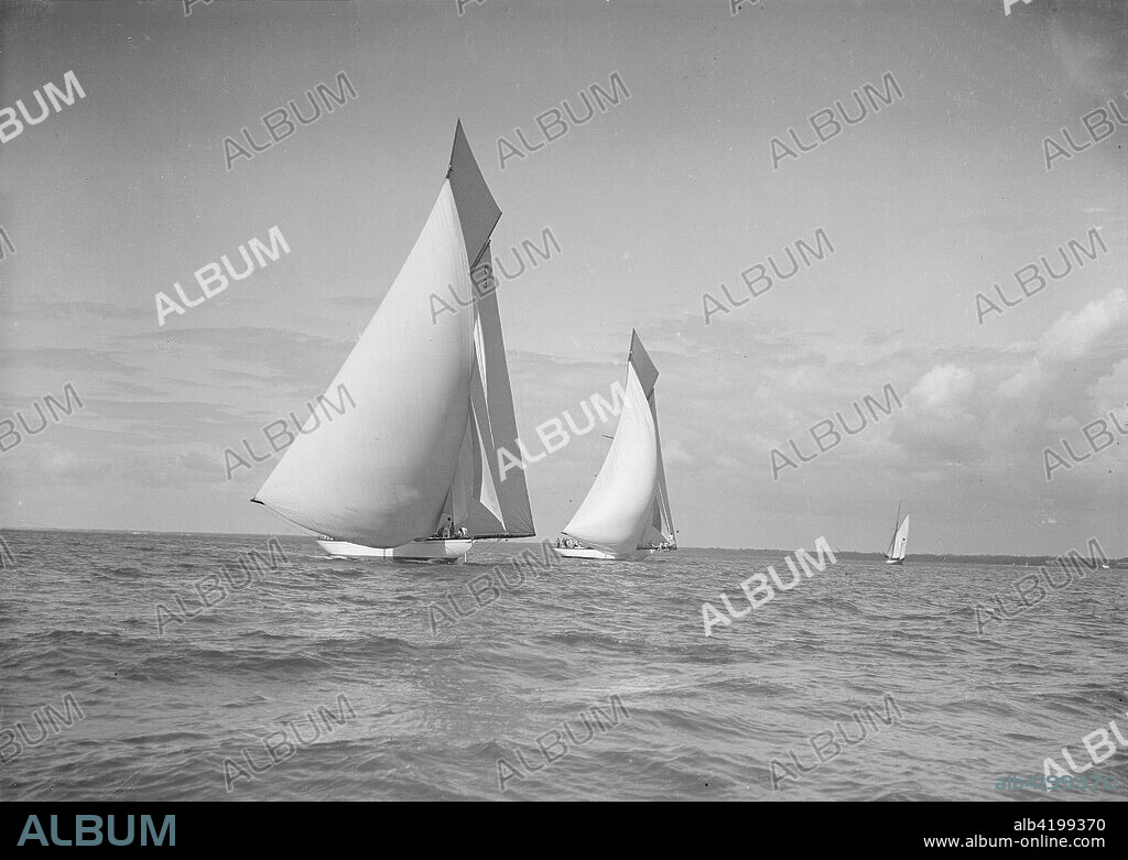 The 19-metre class 'Mariquita' & 'Corona' race downwind under spinnaker, 1911. Both yachts were designed by William Fife III.