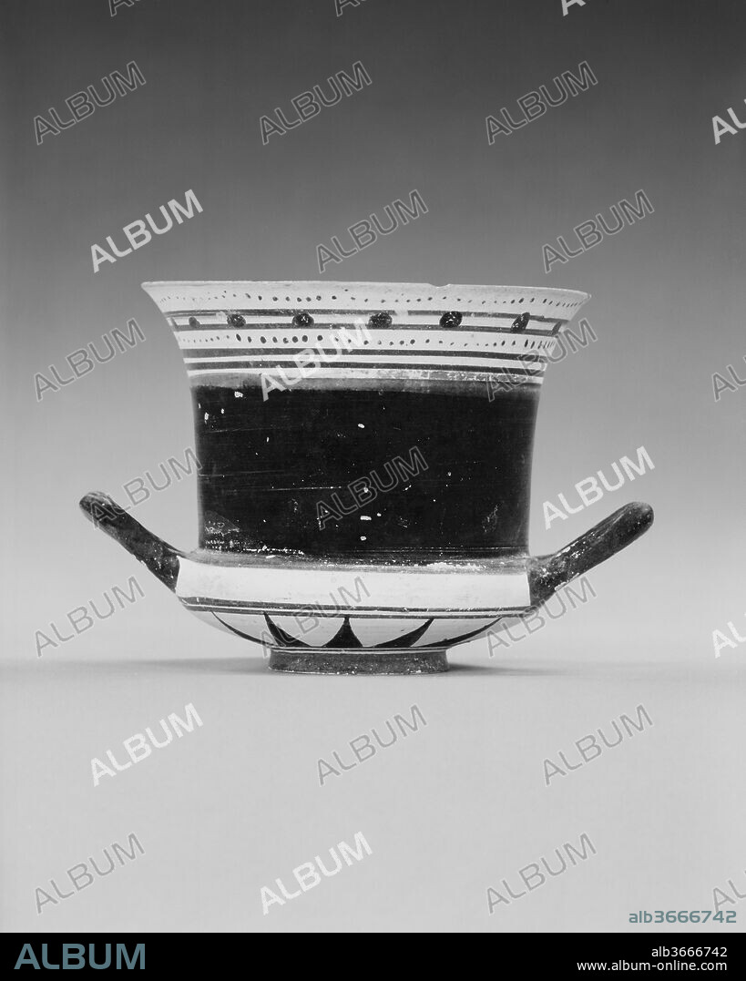 Terracotta lekaina (two-handled drinking cup). Culture: Greek, Laconian. Dimensions: Overall: 3 7/8 x 5 3/4in. (9.8 x 14.5cm)
diameter  4 7/16in. (11.3cm). Date: 6th century B.C..
A specific Laconian vase shape, the lakaina, is never decorated with figural scenes, though bands of dots decorate the lip.