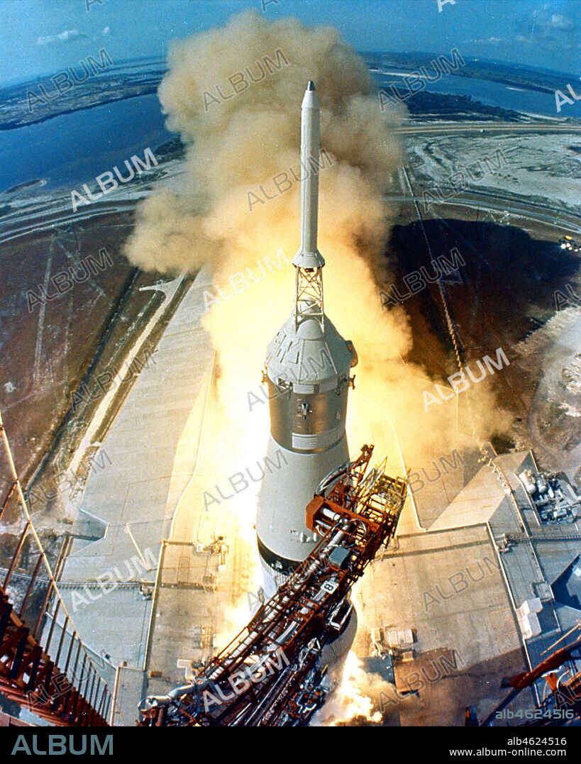 Apollo 11 - NASA, 1969. A Saturn V rocket launches the Apollo 11 crew on the first moon landing mission, July 16, 1969. .