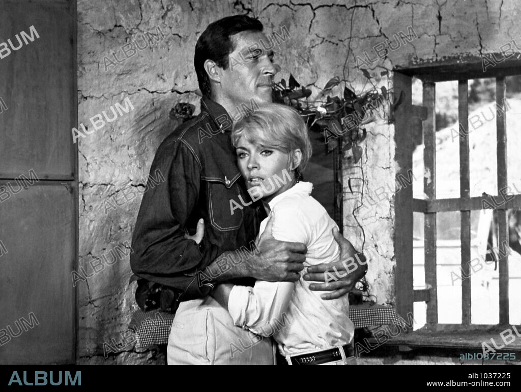 FREDERICK STAFFORD and JEAN SEBERG in THE LOOTERS, 1966 (ESTOUFFADE A LA CARAIBE), directed by JACQUES BESNARD. Copyright PAC/CMC.