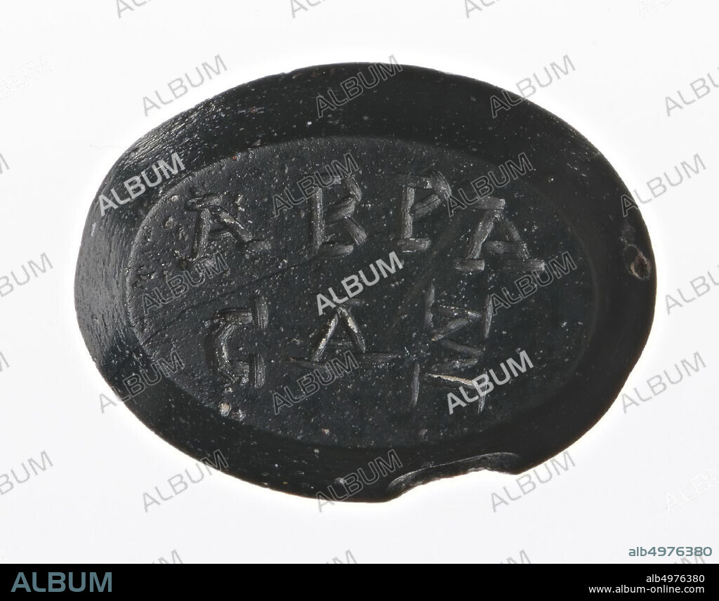 Vz: Abrasax, in the field a kerykeion and symbols., Gem, intaglio, amulet, jasper, Color: dark green, Shape: oval, Processing: edge cut back at the rear compared to front, Method: modeling and detailing with thick and thin rounded wheel grooves and blobs., 16 x 12 mm, D. 3 mm, 2nd century BC. - 7th century AD. -200 BC.