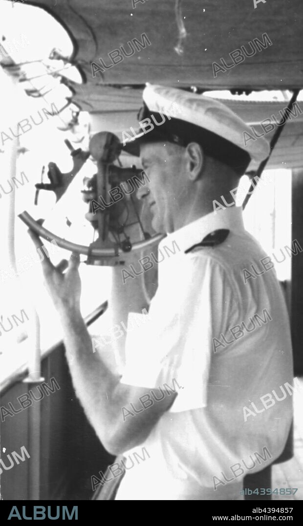 Negative - Martin Spencer-Hogbin using his Hezzanith Sextant, circa 1950, Mr Martin Spencer-Hogbin using his sextant. One of six black and white copy negatives depicting ships and maritime navigational tools that relate to Mr Martin Spencer-Hogbin's seafaring career. Born in England in 1924 Martin Spencer-Hogbin spent his working life in the shipping industry working primarily for the Blue Funnel Line. In 1957 Martin decided to immigrate to Australia from England,.