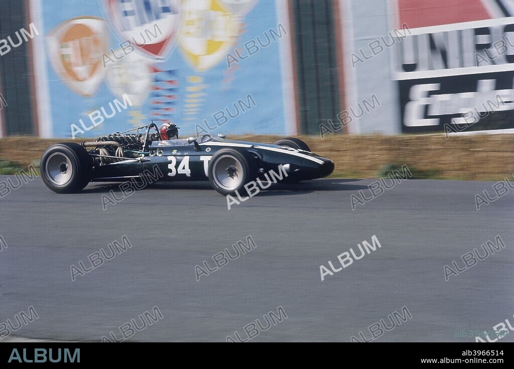 Jo Siffert in Cooper Maserati, Belgian Grand Prix, Spa Francorchamps, 1967. Swiss driver Siffert finished this race in 7th place. Siffert, who won two Grands Prix during his Formula 1 career, was more successful as a competitor in sports cars, winning several races between 1969 and 1971 driving for Porsche. He was killed when his BRM crashed in the Victory Race at Brands Hatch in 1971.
