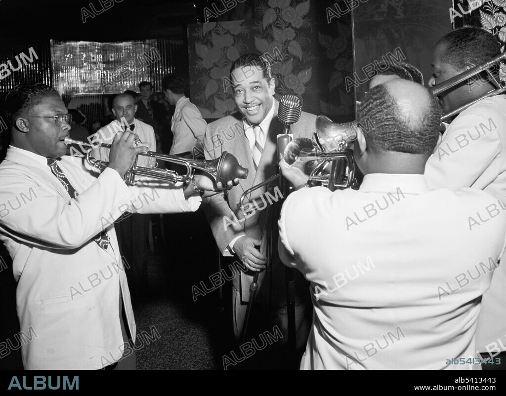 Duke Ellington, Cat Anderson, and Sidney De Paris, Aquarium Jazz Club, New York, N.Y., ca. Nov. 1946. Duke Ellington (1899-1974) was an American composer, pianist, and leader of a jazz orchestra from 1923 until his death over a career spanning more than six decades. He was awarded a posthumous Pulitzer Prize Special Award for music in 1999.