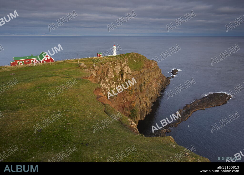 Akraberg lighthouse, Suduroy island, southernmost point of Faroe Islands (Faroes), Denmark, Europe.