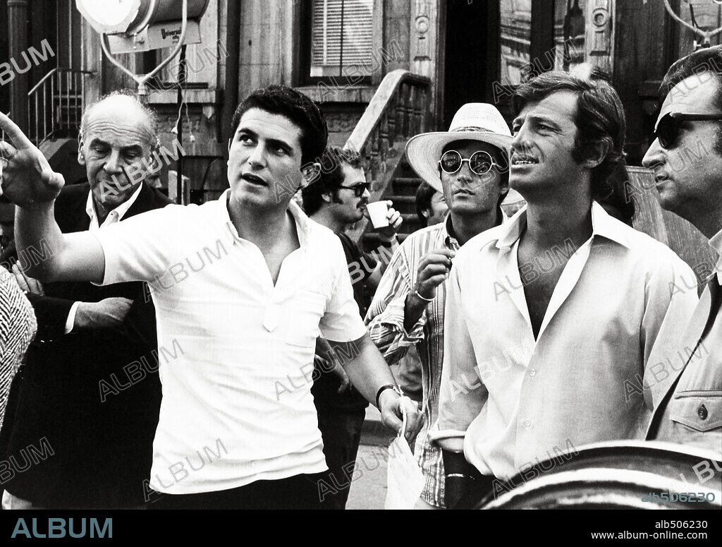 CLAUDE LELOUCH and JEAN-PAUL BELMONDO in LOVE IS A FUNNY THING, 1969 (UN HOMME QUI ME PLAIT), directed by CLAUDE LELOUCH.