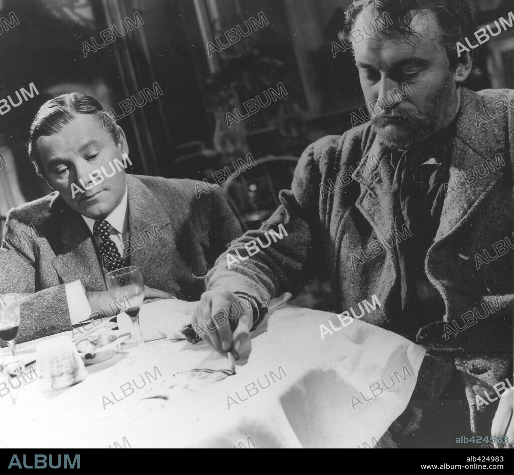 GEORGE SANDERS and HERBERT MARSHALL in THE MOON AND SIXPENCE, 1942, directed by ALBERT LEWIN. Copyright UNITED ARTISTS.