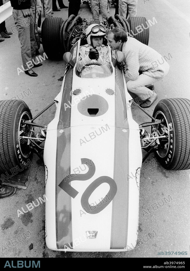 John Surtees in Honda V12, Belgian Grand Prix, 1968. He failed to finish the race, retiring on lap 11 with suspension trouble. John Surtees came to car racing in 1959 after a highly successful motorcycle racing career. He drove in Formula 1 from 1960 to 1972, winning 6 races and becoming World Champion in 1964 with Ferrari. Surtees drove for Honda in the 1967 and 1968 seasons. He formed his own team in 1970, which ceased competing in 1978.