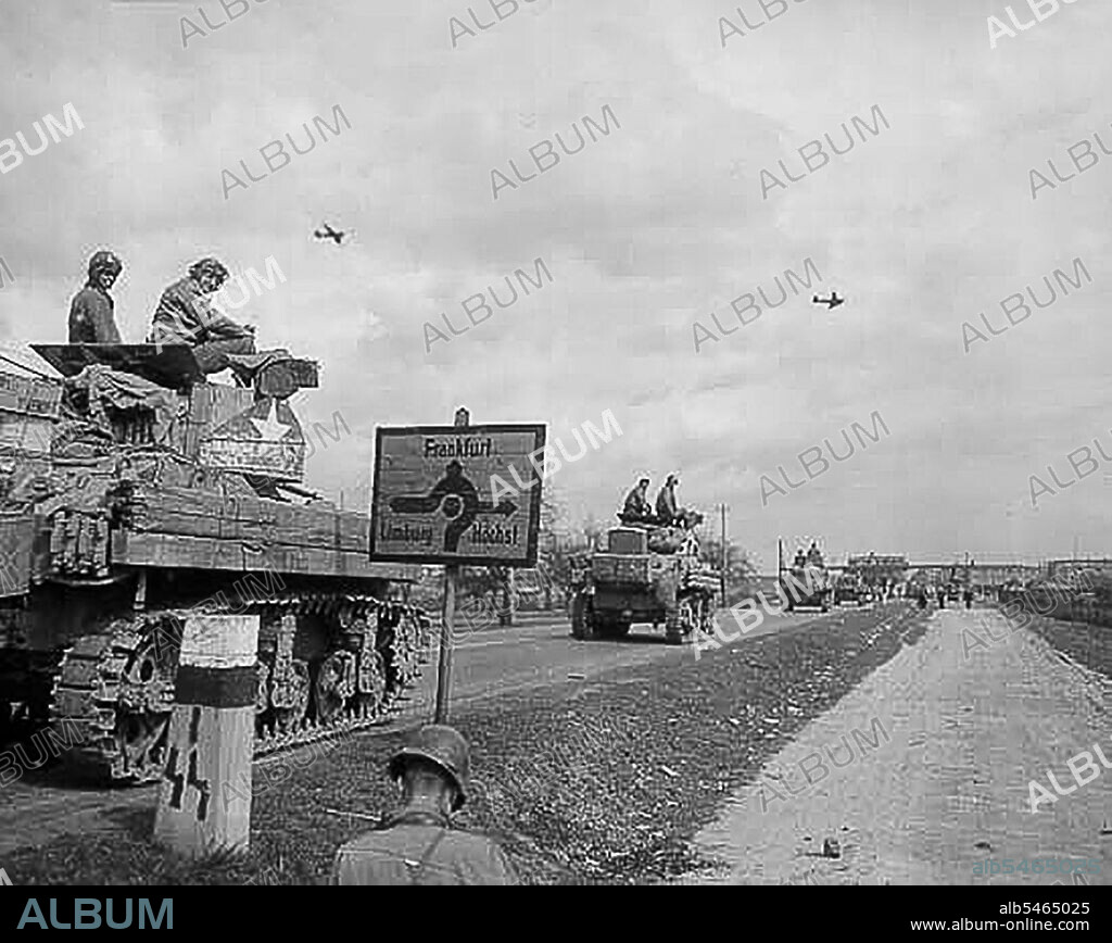 Tanks of the 11th Armored Division, Third U.S. Army, advance along the Autobahn near Frankfurt, Germany, March 31, 1945.