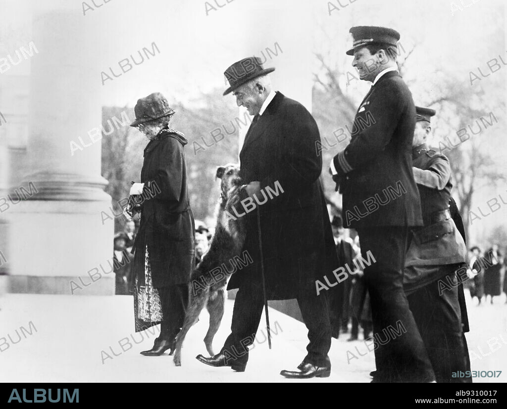 U.S. President Warren G. Harding and First Lady Florence Harding being greeted by their dog Laddie Boy upon returning to White House after trip to Florida, Washington, D.C., USA, USA, National Photo Company, March 1923.