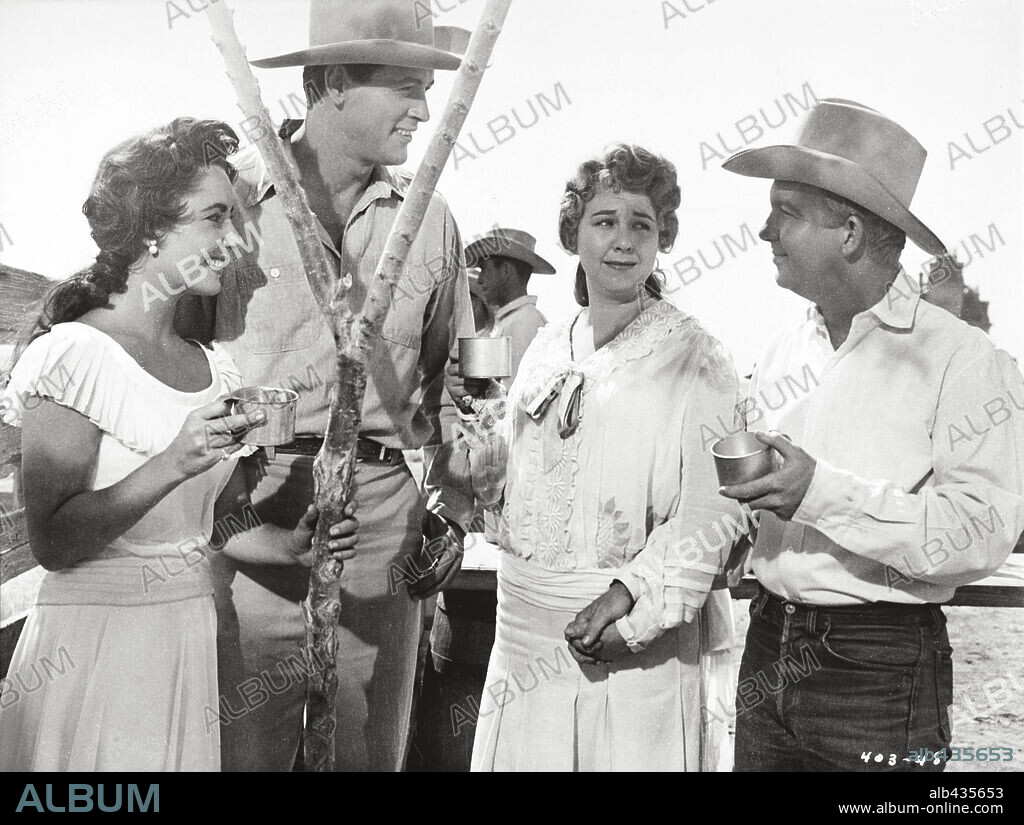 ELIZABETH TAYLOR y ROCK HUDSON en GIGANTE, 1956 (GIANT), dirigida por GEORGE STEVENS. Copyright WARNER BROTHERS.