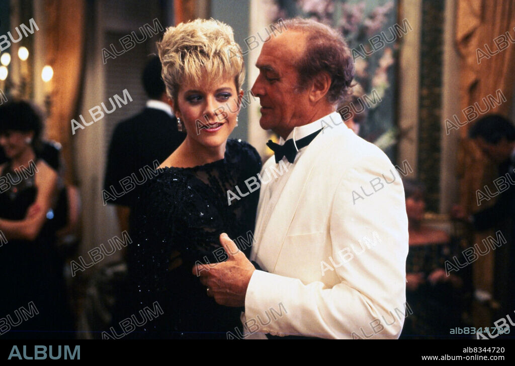 MEG RYAN and ROBERT LOGGIA in ARMED AND DANGEROUS, 1986, directed by MARK L. LESTER. Copyright COLUMBIA PICTURES.