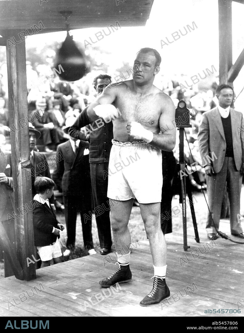 Preparing To Move Man MountainJack Sharkey punching the bag at Orangeburg, N.Y., where he is getting ready for his battle with Primo Carnera, Italian giant, in New York, June 29. June 14, 1933. (Photo by Associated Press Photo).