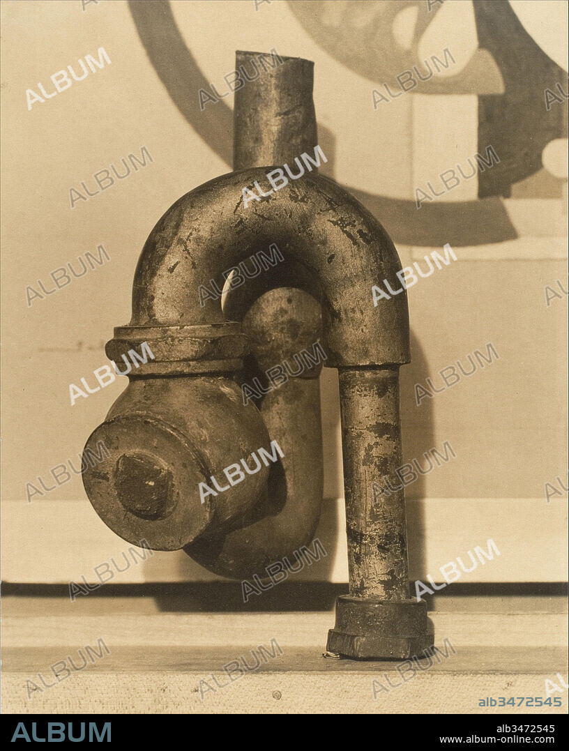 'God' by Baroness Elsa von Freytag-Loringhoven and Morton Schamberg, 1917, Gelatin silver print, 24.1 x 19.2 cm (9 1/2 x 7 9/16 in.), Photographs, Morton Schamberg (American, Philadelphia, Pennsylvania 1881–1918 Philadelphia, Pennsylvania), Elsa von Freytag-Loringhoven (German, 1874–1927), This photograph of a drain pipe attached to a miter box documents one of the most famous examples of American Dada. The sculpture God, a readymade in the spirit of Marcel Duchamp's upended urinal entitled Fountain, has traditionally been attributed to Schamberg, a talented photographer and painter who blended machine imagery and abstraction.