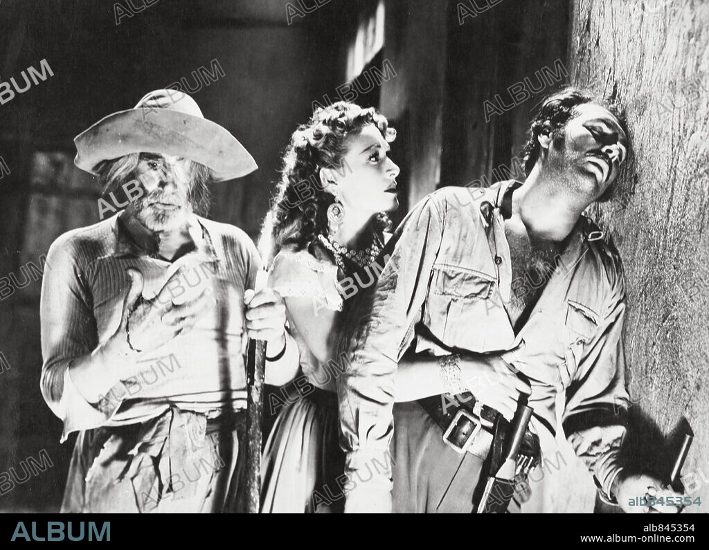 ALICIA CARO and RENE CARDONA in LA VORAGINE, 1949, directed by MIGUEL ZACARIAS. Copyright DIANA FILM.